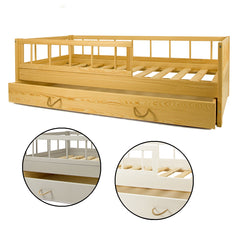 Cama infantil de madera con barandilla y cajón.